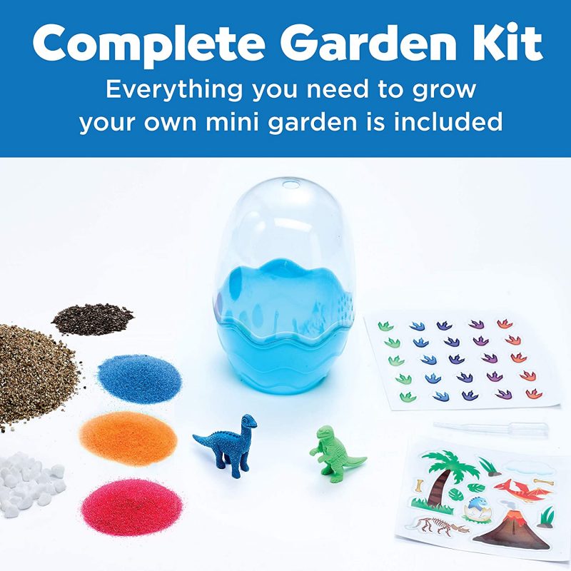 MINI TERRARIUM FOR KIDS - Decorate, plant and grow your own mini terrarium in a dinosaur egg-shaped environment. Quick grow seeds and fun dinosaur decorations bring your habitat to life (Completed garden measures 5 ¼” h x 3” w. ) COMPLETE KIDS GARDENING KIT – Everything you need to grow your own mini dinosaur garden is included, just add water! Gardening kit includes potting mix, quick growing chia seeds, dino themed stickers, dimensional accents, fun mini figures and decorative colored sand QUICK GROW GARDEN KIT – Easy indoor gardening with great results! Our to grow terrarium kit for kids means a green thumb for all! Included chia seeds sprout within 3-5 days of planting for immediate results FUN WHILE LEARNING – Explore the wonder of nature and science with a mini terrarium. This STEAM science activity is fun to do with a unique learning experience. Spark curiosity, inspire creativity and intrigue about prehistoric times while creating a dinosaur egg terrarium BUILD CREATIVE CONFIDENCE – Growing a garden is a creative activity that encourages independent play and creative confidence while developing nurturing skills, responsibility and patience