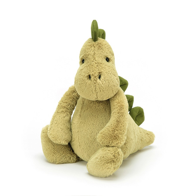 A prehistoric pal! Bashful Dino is making history! Soft, not scaly, this mossy matey has chunky stomper-feet, a snuggly snout and fine squishy spines from head to tail! This dynamic dino is always rambling round, giving hugs to every t-rex and triceratops! Medium Bashful Dino is about 12 inches tall.