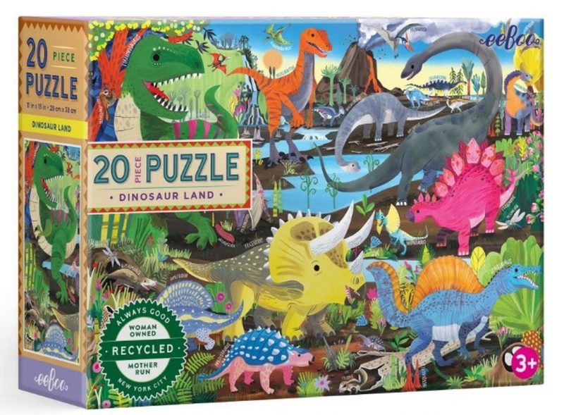 Dinosaur Land 20 piece jigsaw puzzle is perfect for the youngest paleontology enthusiast! This colorful prehistoric landscape features a variety of different dinosaurs and bubbling volcanoes. Perfect for ages 3 and up with its jumbo-sized and thick puzzle pieces. Encourages hand-eye coordination, fine motor skills, and problem solving. Puzzles are the perfect project for children and for family activities. Children feel challenged by the task, and proud of its completion! Age: 3 + Piece Count: 20 glossy pieces Puzzle Size: 15 x 11 inches when finished. Illustrator: Linda Bleck